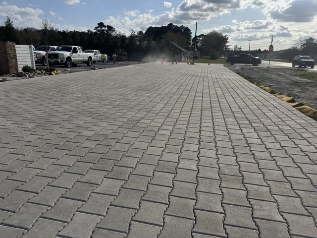Final stages of commercial parking lot expansion showing professional completion